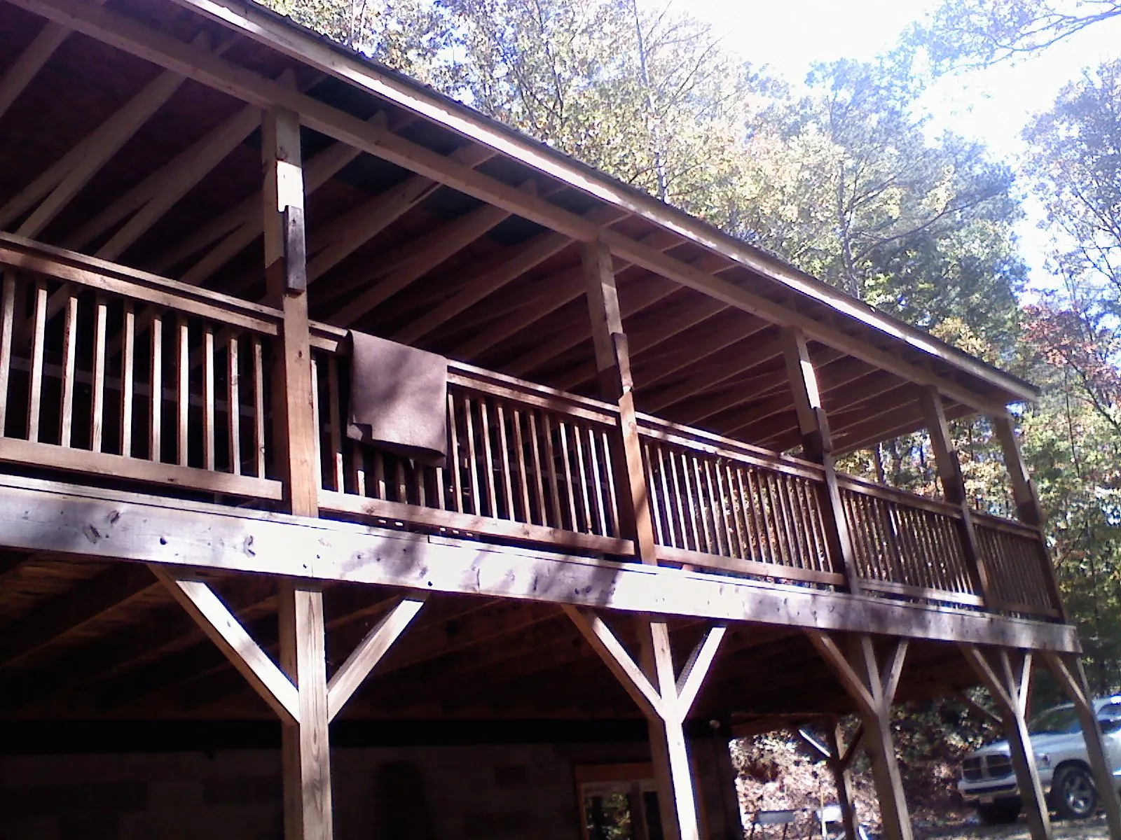 Timber framing under a new elevated porch and deck — Roof Leak Repair in Delta City by Roofing Brothers